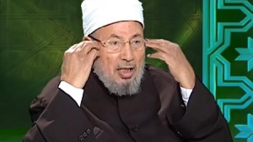 العلّامة القرضاوي يرد على إدراجه بقوائم الإنتربول