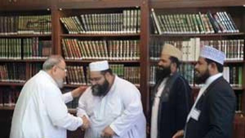 القرضاوي يستقبل رئيس مجلس علماء باكستان